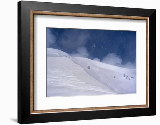 Wyoming. Man getting ready for descent of Mount Taylor, highest peak in Southern Teton Mountains-Howie Garber-Framed Photographic Print