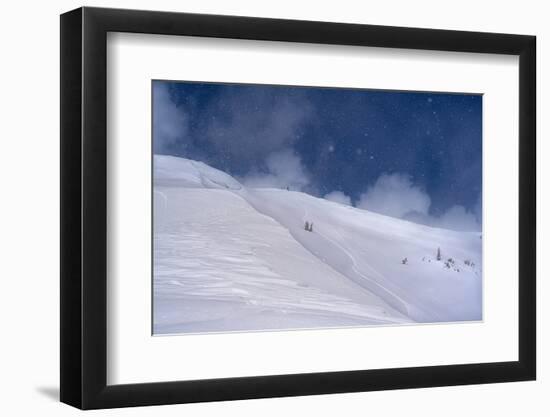 Wyoming. Man getting ready for descent of Mount Taylor, highest peak in Southern Teton Mountains-Howie Garber-Framed Photographic Print