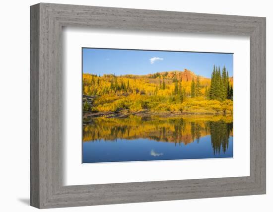 Wyoming, Sublette County. The Red Cliffs in the Wyoming Range mountains is reflected-Elizabeth Boehm-Framed Photographic Print