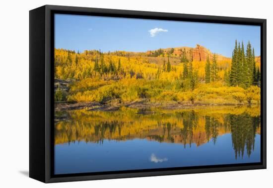 Wyoming, Sublette County. The Red Cliffs in the Wyoming Range mountains is reflected-Elizabeth Boehm-Framed Premier Image Canvas