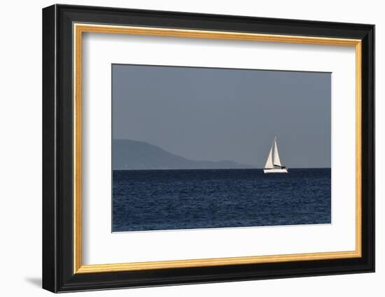 Yacht. Sailing Boat. Sailboat White Sail Boat between Blue Sky and Dark Blue Sea. an Island on Fore-PROtoys-Framed Photographic Print