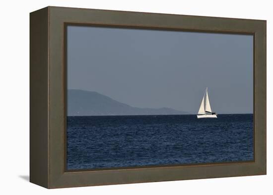 Yacht. Sailing Boat. Sailboat White Sail Boat between Blue Sky and Dark Blue Sea. an Island on Fore-PROtoys-Framed Premier Image Canvas