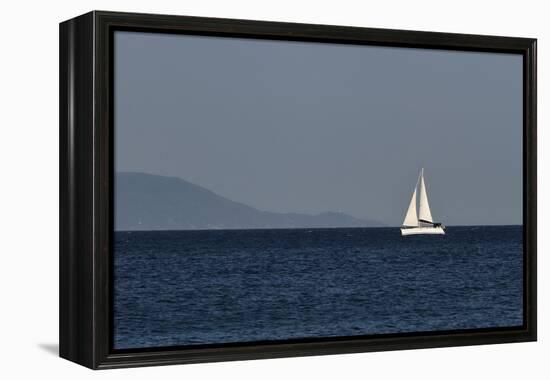 Yacht. Sailing Boat. Sailboat White Sail Boat between Blue Sky and Dark Blue Sea. an Island on Fore-PROtoys-Framed Premier Image Canvas