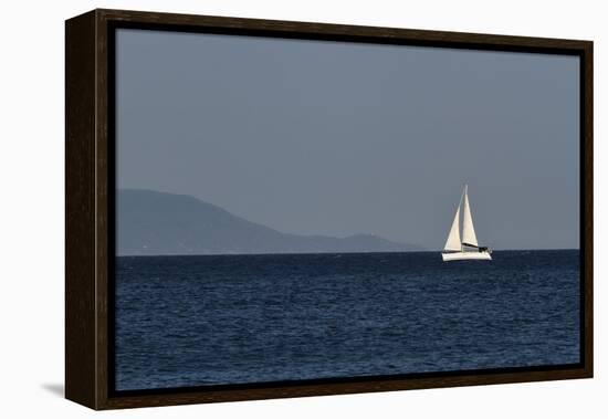 Yacht. Sailing Boat. Sailboat White Sail Boat between Blue Sky and Dark Blue Sea. an Island on Fore-PROtoys-Framed Premier Image Canvas