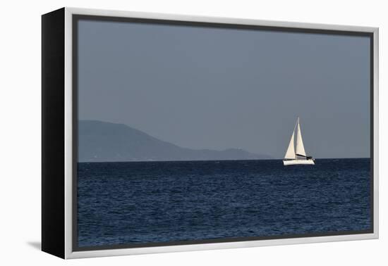 Yacht. Sailing Boat. Sailboat White Sail Boat between Blue Sky and Dark Blue Sea. an Island on Fore-PROtoys-Framed Premier Image Canvas