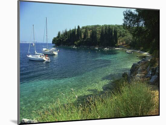 Yachts Moored Offshore in Kalami Bay on the Coast, Corfu, Ionian Islands, Greek Islands, Greece-Kathy Collins-Mounted Photographic Print