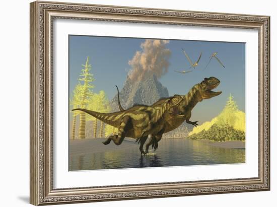 Yangchuanosaurus Dinosaurs Running across a Stream as a Volcano Erupts-null-Framed Art Print