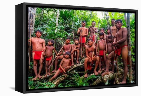 Yanomami tribe man standing in the jungle, southern Venezuela-Michael Runkel-Framed Premier Image Canvas