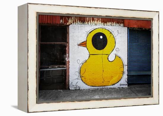 Yellow Duck on Brick Wall in Brooklyn NY-null-Framed Stretched Canvas