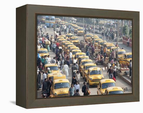 Yellow Kolkata Taxis and Commuters at Howrah Railway Station, Howrah, Kolkata (Calcutta), India-Annie Owen-Framed Premier Image Canvas