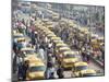 Yellow Kolkata Taxis and Commuters at Howrah Railway Station, Howrah, Kolkata (Calcutta), India-Annie Owen-Mounted Photographic Print