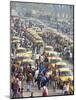 Yellow Kolkata Taxis and Commuters at Howrah Railway Station, Howrah, Kolkata (Calcutta), India-Annie Owen-Mounted Photographic Print