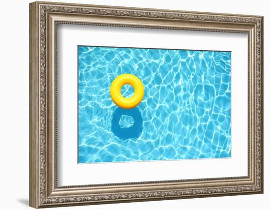 Yellow Pool Float, Ring Floating in a Refreshing Blue Swimming Pool-StacieStauffSmith Photos-Framed Photographic Print