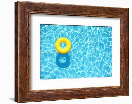 Yellow Pool Float, Ring Floating in a Refreshing Blue Swimming Pool-StacieStauffSmith Photos-Framed Photographic Print