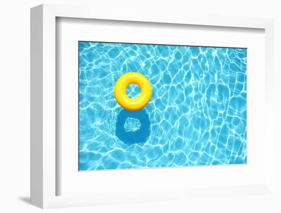 Yellow Pool Float, Ring Floating in a Refreshing Blue Swimming Pool-StacieStauffSmith Photos-Framed Photographic Print