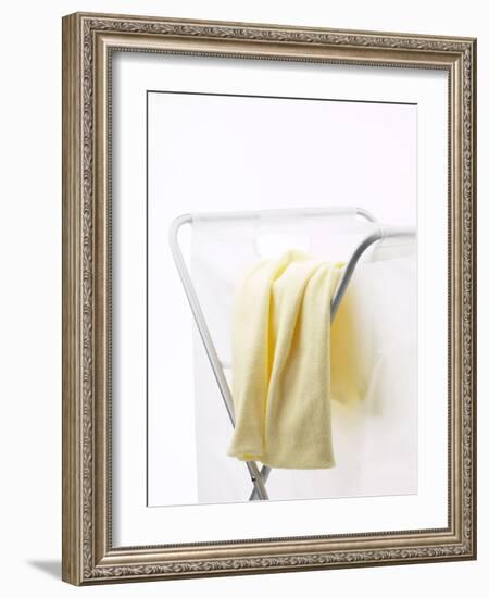 Yellow T-Shirt on Laundry Hamper-null-Framed Photographic Print