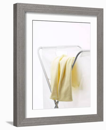 Yellow T-Shirt on Laundry Hamper-null-Framed Photographic Print