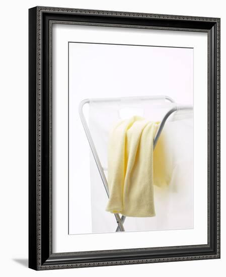 Yellow T-Shirt on Laundry Hamper-null-Framed Photographic Print