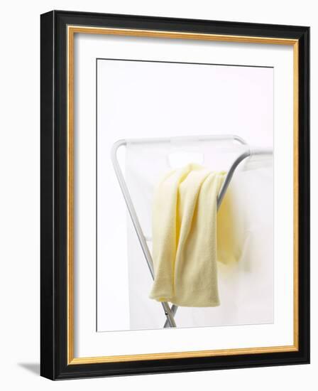 Yellow T-Shirt on Laundry Hamper-null-Framed Photographic Print