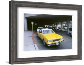 Yellow taxi cab at airport-null-Framed Photographic Print