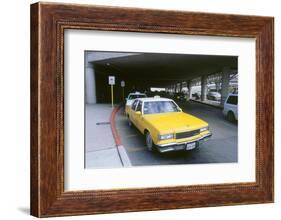 Yellow taxi cab at airport-null-Framed Photographic Print