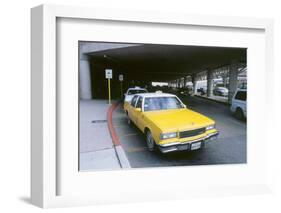 Yellow taxi cab at airport-null-Framed Photographic Print