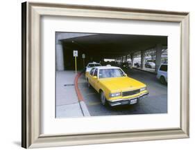 Yellow taxi cab at airport-null-Framed Photographic Print