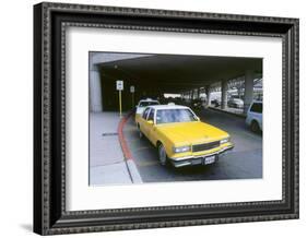 Yellow taxi cab at airport-null-Framed Photographic Print