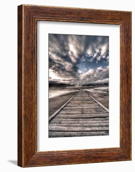 Yellowstone, Wyoming: a Wooden Path Going Through Norris Geyser Basin on a Cloudy Sunset-Brad Beck-Framed Photographic Print