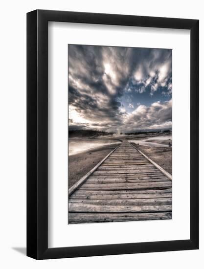 Yellowstone, Wyoming: a Wooden Path Going Through Norris Geyser Basin on a Cloudy Sunset-Brad Beck-Framed Photographic Print