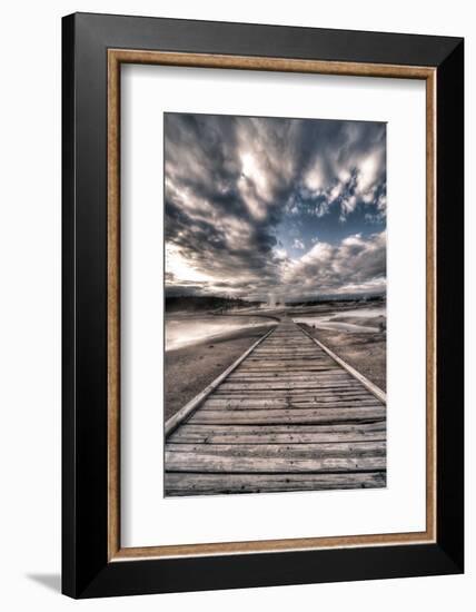 Yellowstone, Wyoming: a Wooden Path Going Through Norris Geyser Basin on a Cloudy Sunset-Brad Beck-Framed Photographic Print