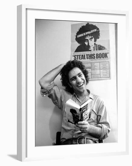 Yippie Leader Abbie Hoffman Holding Copy of His Book-John Shearer-Framed Premium Photographic Print