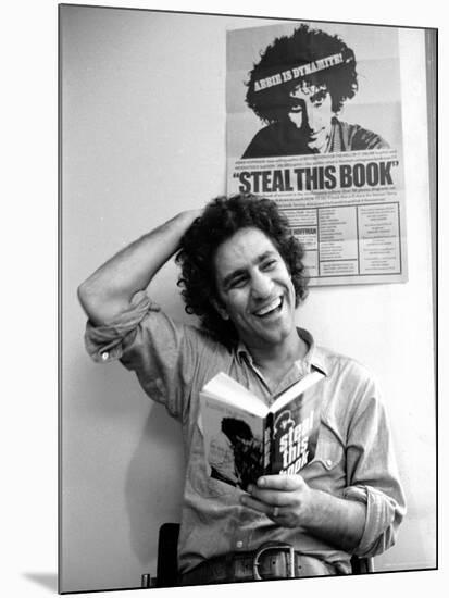 Yippie Leader Abbie Hoffman Holding Copy of His Book-John Shearer-Mounted Premium Photographic Print