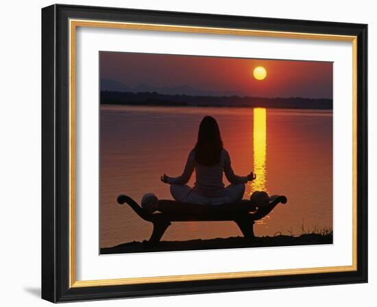 Yoga on a Saddle Bench Watching the Sun Go Down across the Zambesi River, Zambia-John Warburton-lee-Framed Photographic Print