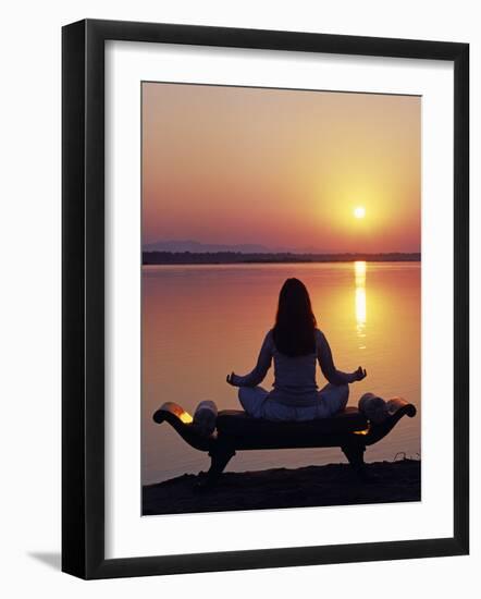 Yoga on a Saddle Bench Watching the Sun Go Down across the Zambesi River, Zambia-John Warburton-lee-Framed Photographic Print