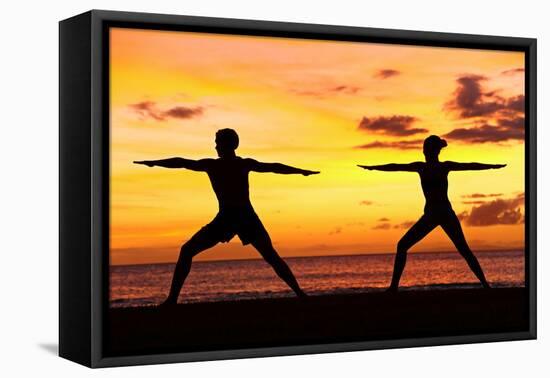 Yoga People Training and Meditating in Warrior Pose Outside by Beach at Sunrise or Sunset-Maridav-Framed Premier Image Canvas