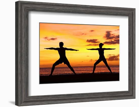 Yoga People Training and Meditating in Warrior Pose Outside by Beach at Sunrise or Sunset-Maridav-Framed Photographic Print