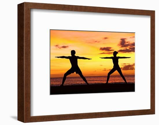 Yoga People Training and Meditating in Warrior Pose Outside by Beach at Sunrise or Sunset-Maridav-Framed Photographic Print