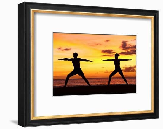 Yoga People Training and Meditating in Warrior Pose Outside by Beach at Sunrise or Sunset-Maridav-Framed Photographic Print