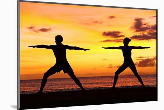 Yoga People Training and Meditating in Warrior Pose Outside by Beach at Sunrise or Sunset-Maridav-Mounted Photographic Print