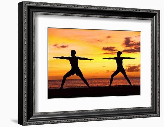 Yoga People Training and Meditating in Warrior Pose Outside by Beach at Sunrise or Sunset-Maridav-Framed Photographic Print