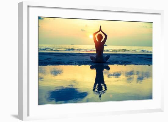 Yoga Woman Sitting In Lotus Pose On The Beach During Sunset-De Visu-Framed Art Print