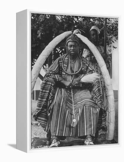 Yoruba Tribal Ruler in West Nigeria on Throne Surrounded by Elephant Tusks-null-Framed Premier Image Canvas