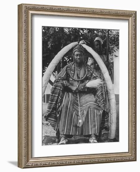 Yoruba Tribal Ruler in West Nigeria on Throne Surrounded by Elephant Tusks-null-Framed Photographic Print