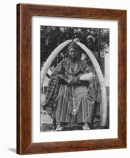 Yoruba Tribal Ruler in West Nigeria on Throne Surrounded by Elephant Tusks-null-Framed Photographic Print