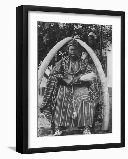 Yoruba Tribal Ruler in West Nigeria on Throne Surrounded by Elephant Tusks-null-Framed Photographic Print