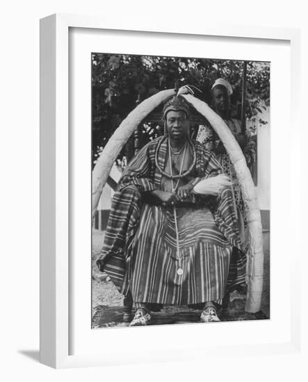 Yoruba Tribal Ruler in West Nigeria on Throne Surrounded by Elephant Tusks-null-Framed Photographic Print