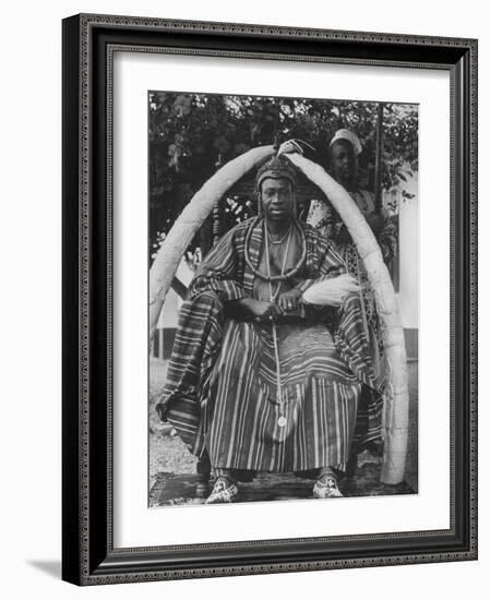 Yoruba Tribal Ruler in West Nigeria on Throne Surrounded by Elephant Tusks-null-Framed Photographic Print