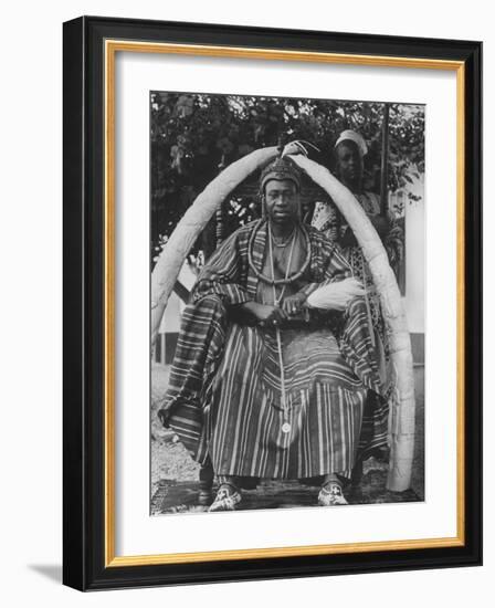 Yoruba Tribal Ruler in West Nigeria on Throne Surrounded by Elephant Tusks-null-Framed Photographic Print