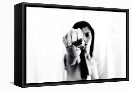 Young Adult Female with Arm Outstretched Like Punch-Torsten Richter-Framed Premier Image Canvas